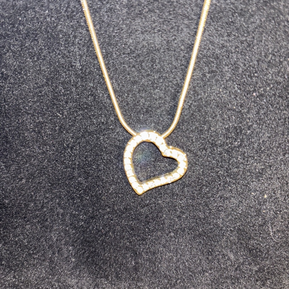 BMNY SIGNED HEART PENDANT  GOLDTONE 19" CORD & rhinestones? sliding heart